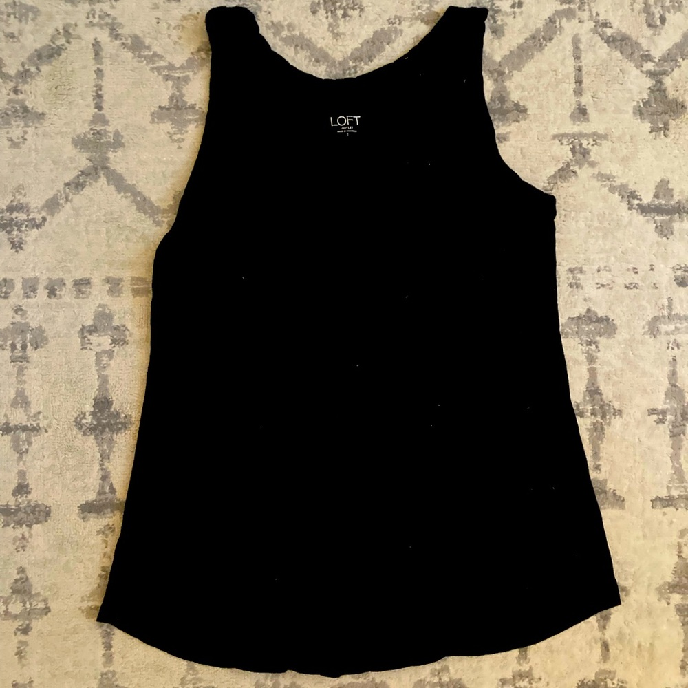 Black tank top from Loft. Slimmer too and flare out bottom.